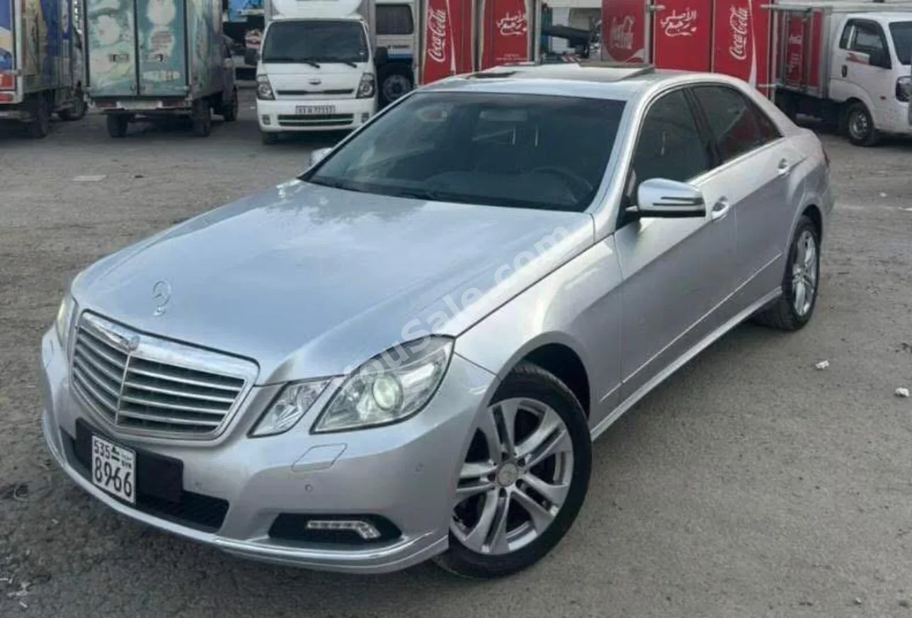 Mercedes-Benz  E-Class  350  2011  Automatic  200,000 km  6 Cylinder  RWD  Sedan  Silver  Gasoline
