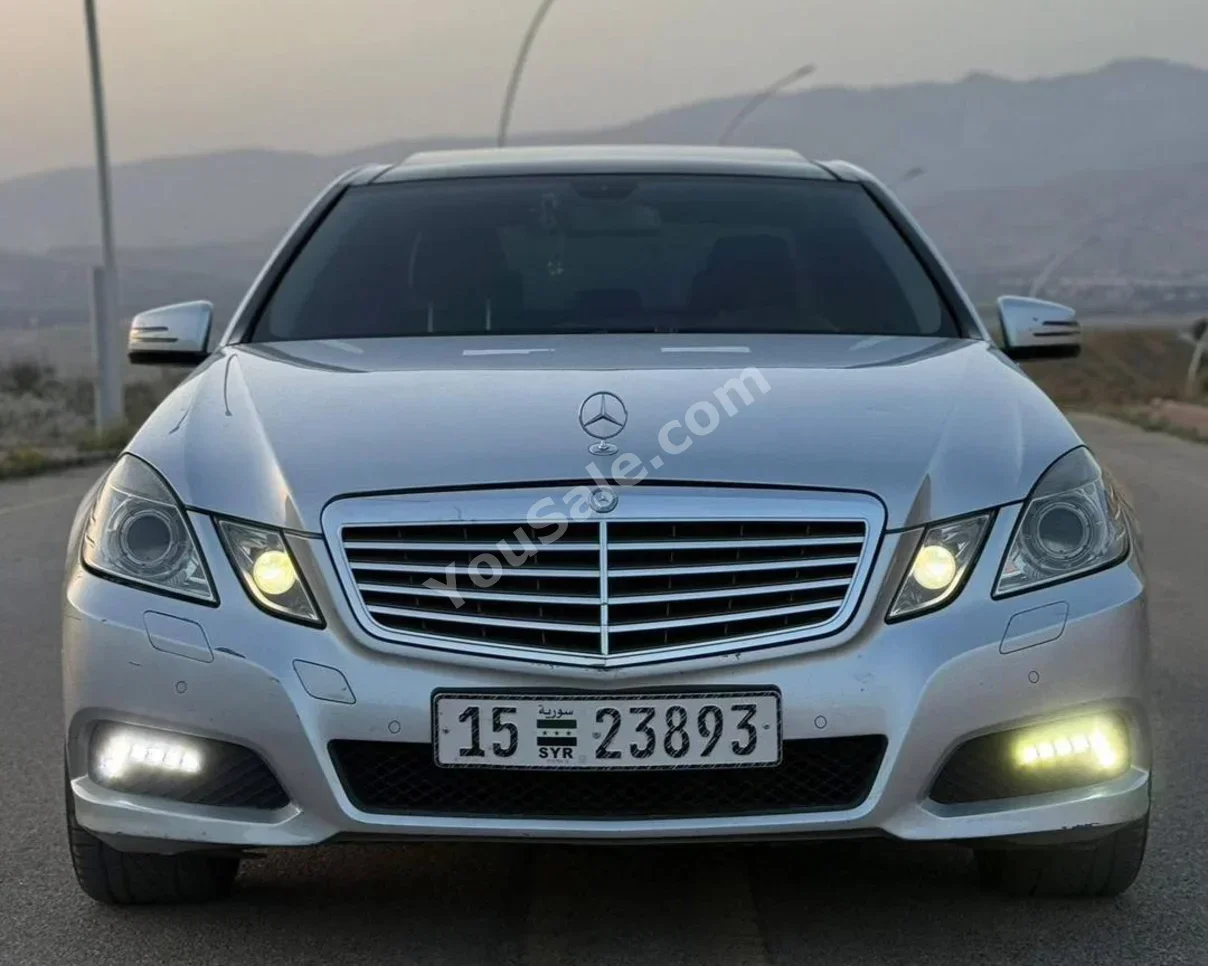 Mercedes-Benz  E-Class  350  2011  Automatic  177,000 km  6 Cylinder  RWD  Sedan  Silver  Gasoline