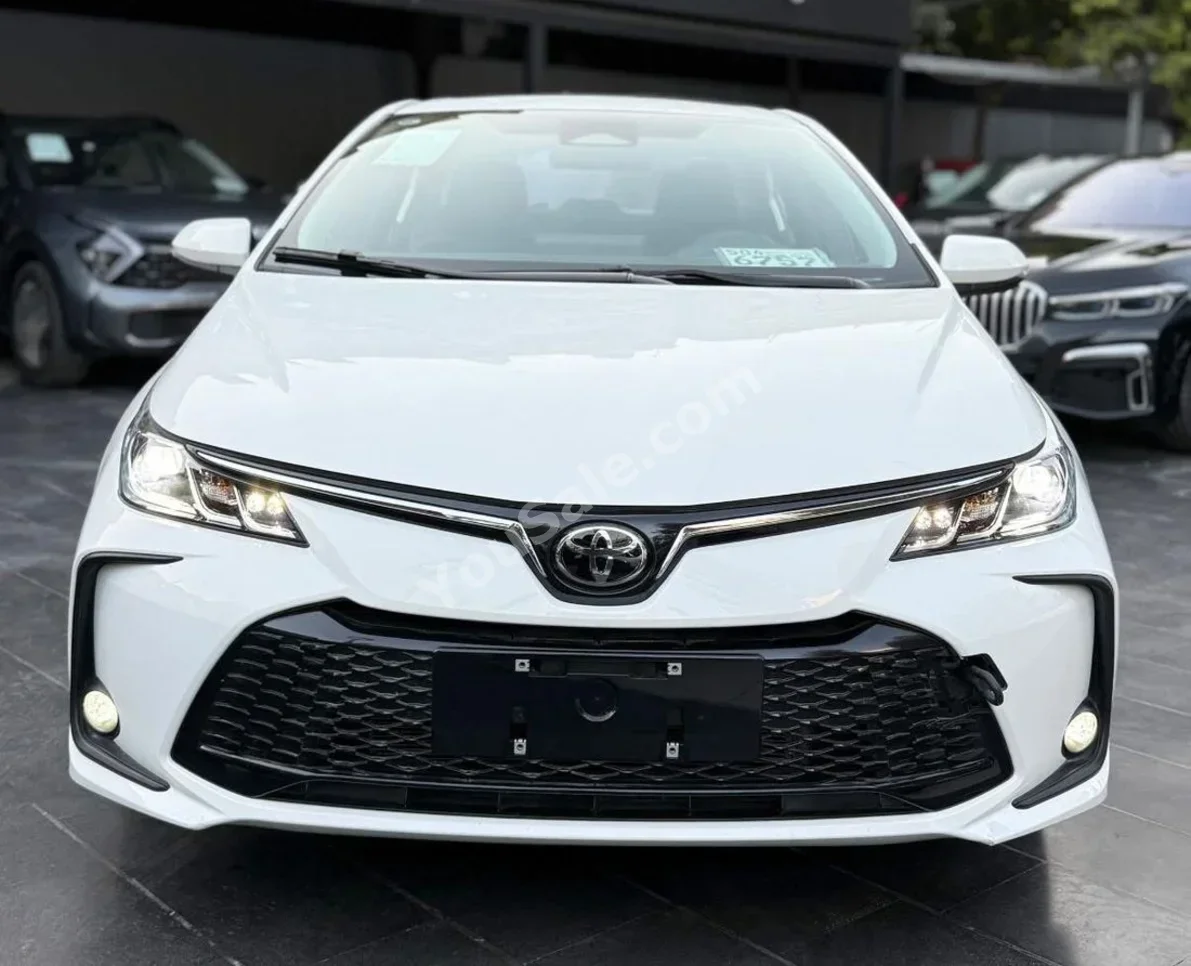 Toyota Corolla 2025 Automatic 0 km 4 Cylinder FWD Sedan White Hybrid
