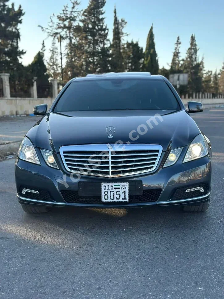 Mercedes-Benz  E-Class  300  2010  Automatic  140,000 km  6 Cylinder  RWD  Sedan  Black  Gasoline