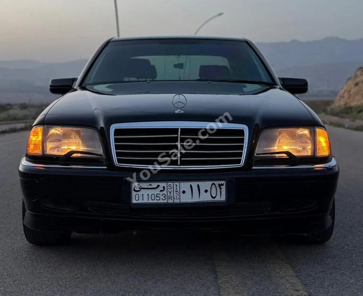 Mercedes-Benz  E-Class  240  1994  Automatic  300,000 km  6 Cylinder  RWD  Sedan  Black  Gasoline