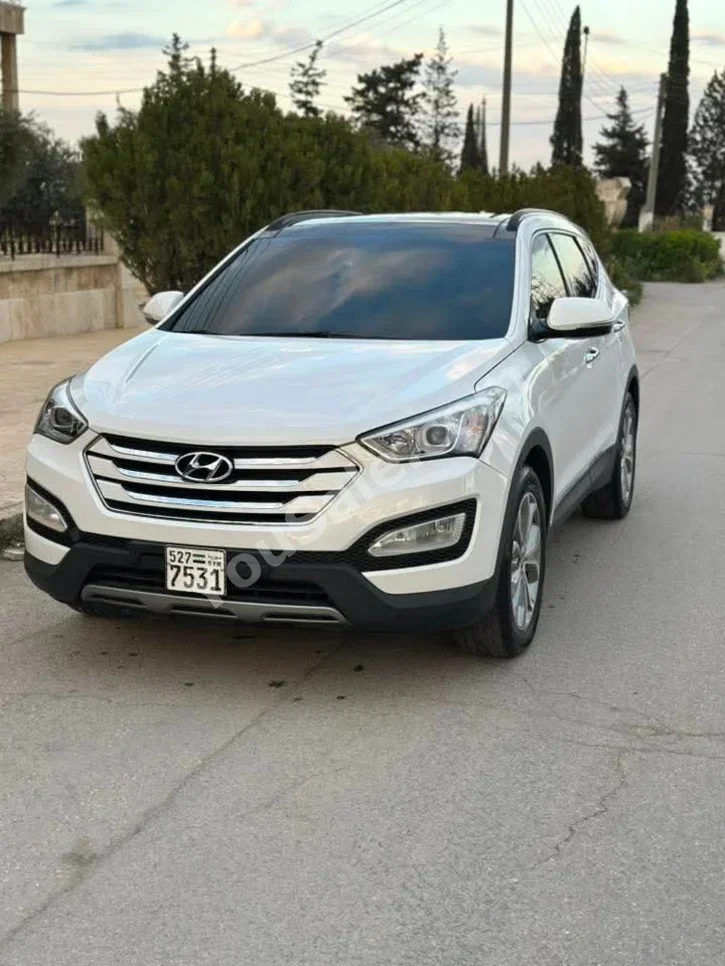 Hyundai  Santa Fe  2015  Automatic  187,000 km  4 Cylinder  FWD  SUV  White  Diesel