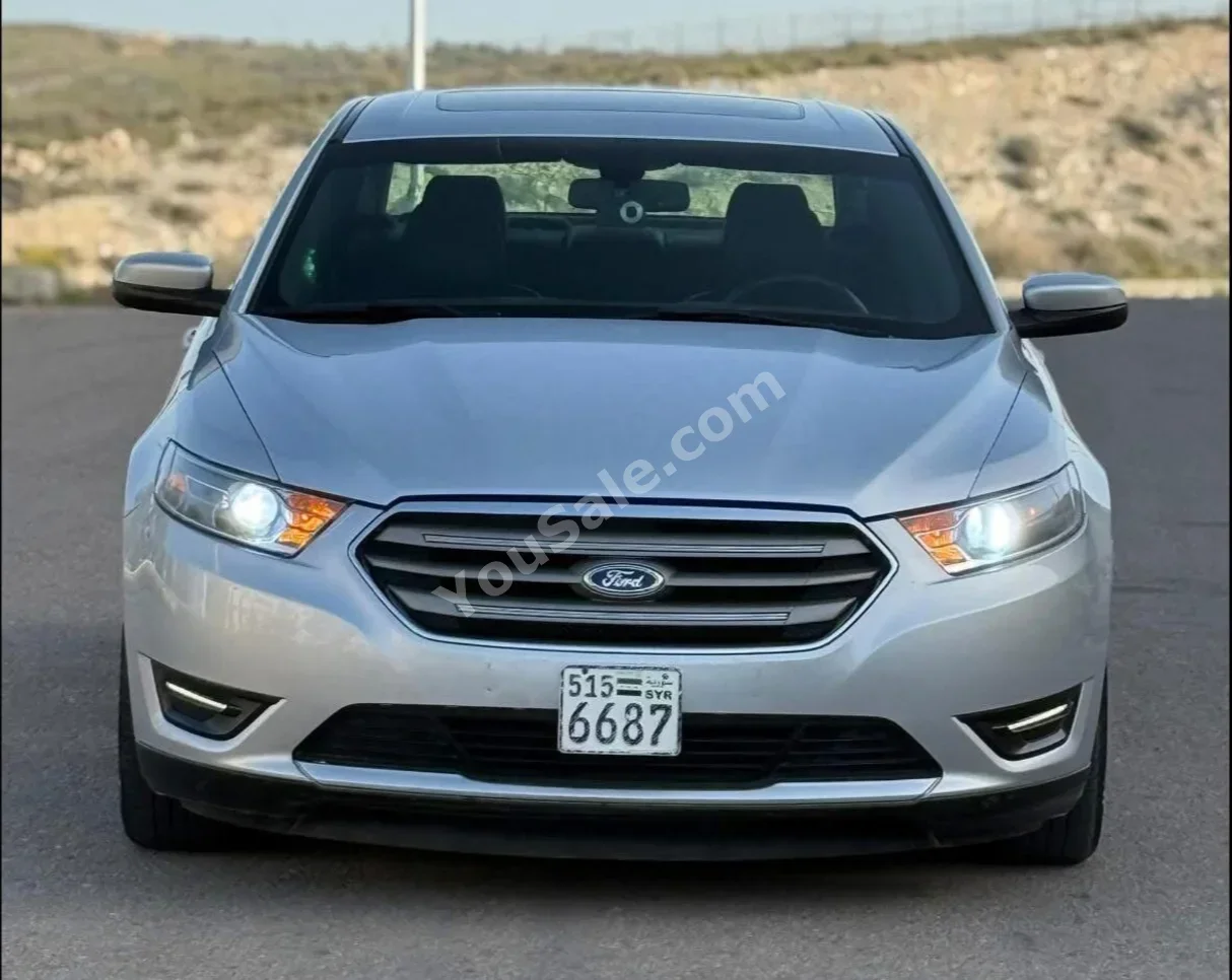 فورد  تورس  اس اي ال  2014  اتوماتيك  100,000 كم  6 سلندر  دفع أمامي  سيدان  فضي  بنزين