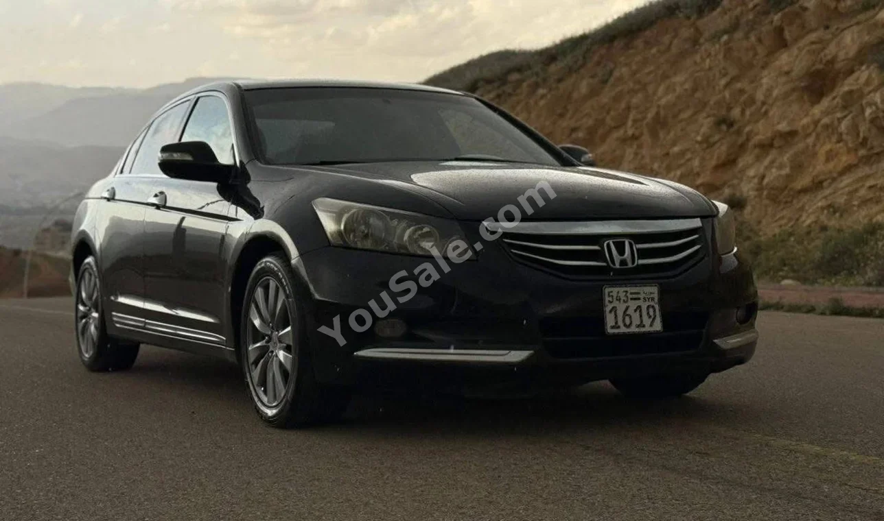 Honda  Accord  2012  Automatic  140,000 km  6 Cylinder  FWD  Sedan  Black  Gasoline