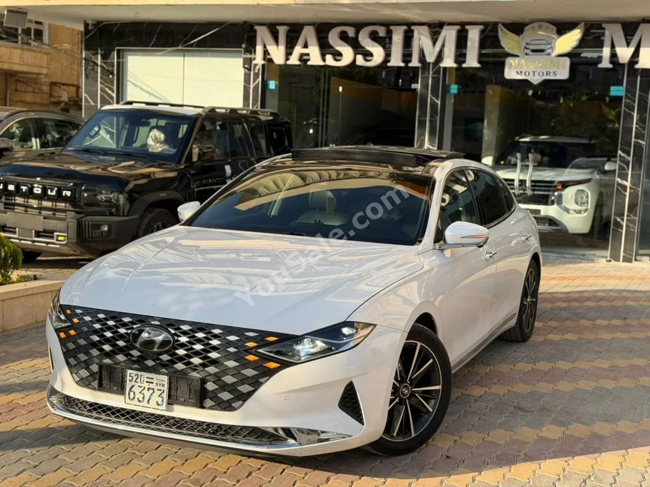 Hyundai  Grandeur  2021  Automatic  87,000 km  4 Cylinder  FWD  Sedan  White  Gasoline