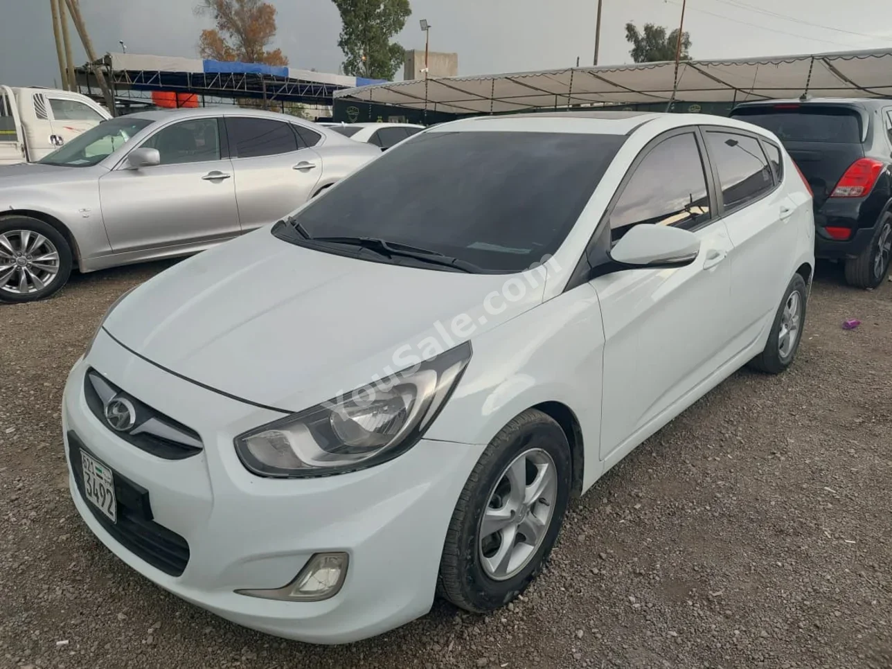 Hyundai Accent 2012 Automatic 170,000 km 4 Cylinder FWD Hatchback White Gasoline