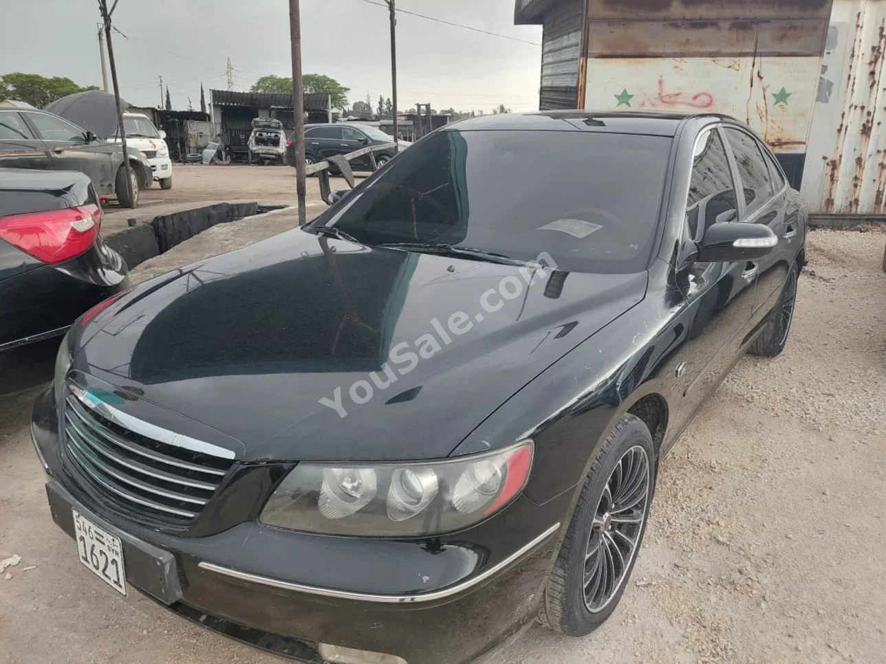 Hyundai  Grandeur  2009  Automatic  200,000 km  4 Cylinder  FWD  Sedan  Black  Gasoline