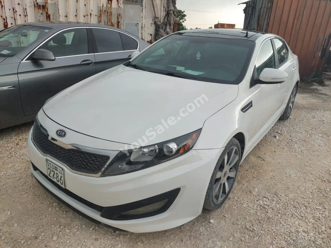 Kia  Optima  2013  Automatic  200,000 km  4 Cylinder  FWD  Sedan  White  Gasoline