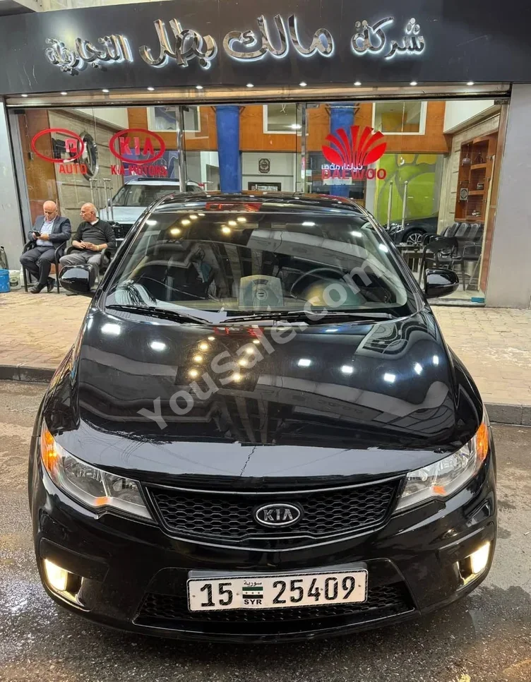 Kia Forte 2012 Automatic 67,000 km 4 Cylinder FWD Coupe / Sport Black Gasoline