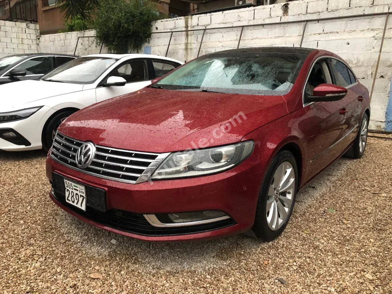 فوكس واغن باسات سي سي 2015 اتوماتيك 151,000 كم 4 سلندر دفع أمامي سيدان أحمر غامق بنزين