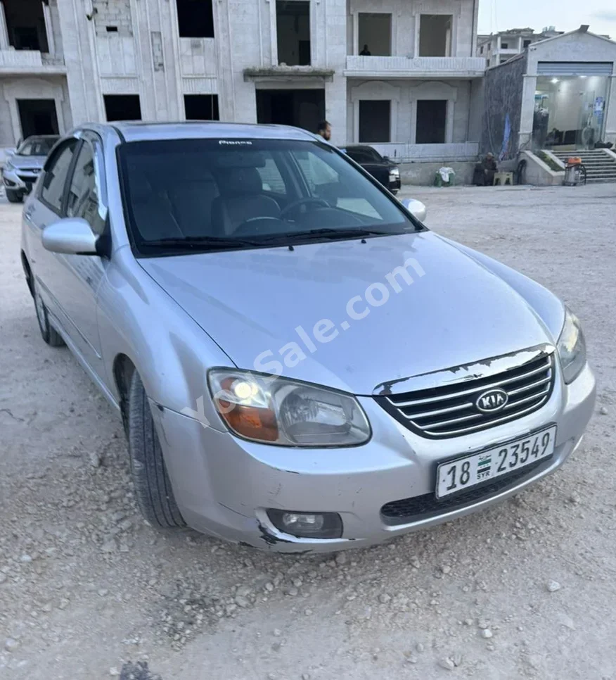 كيا سيراتو 2008 اتوماتيك 193,000 كم 4 سلندر دفع أمامي سيدان فضي بنزين