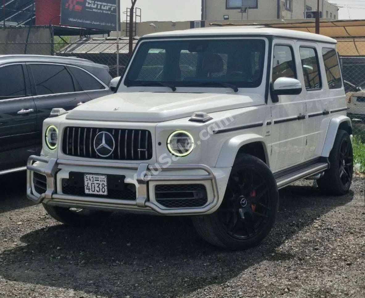 مرسيدس - بنز جي - كلاس 63 AMG 2022 اتوماتيك 80,000 كم 8 سلندر دفع كلي مستمر اس يو في أبيض بنزين