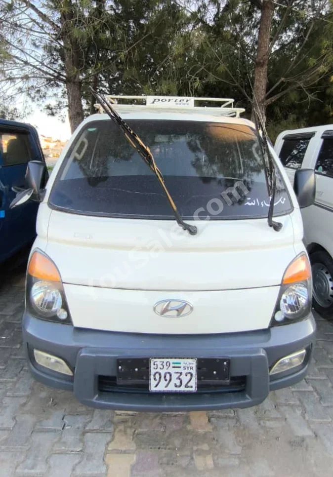 Hyundai Porter Porter 2015 Manual 118,000 km 4 Cylinder RWD Pick Up White Diesel