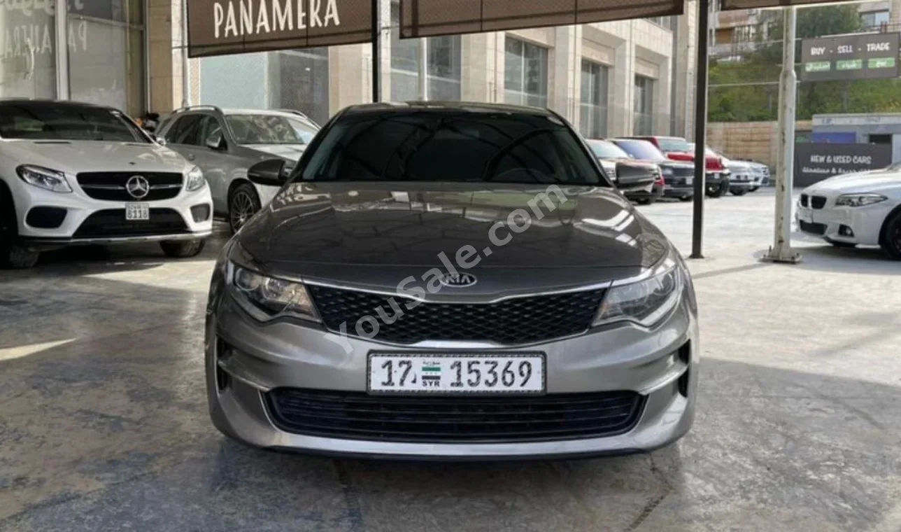 كيا  اوبتما  2019  اتوماتيك  150,000 كم  4 سلندر  دفع أمامي  سيدان  رمادي  بنزين