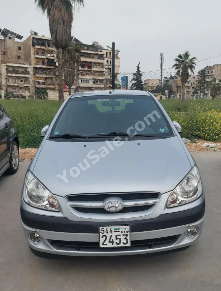 هيونداي  جيتز  2007  اتوماتيك  102,000 كم  4 سلندر  دفع أمامي  هاتشباك  فضي  بنزين