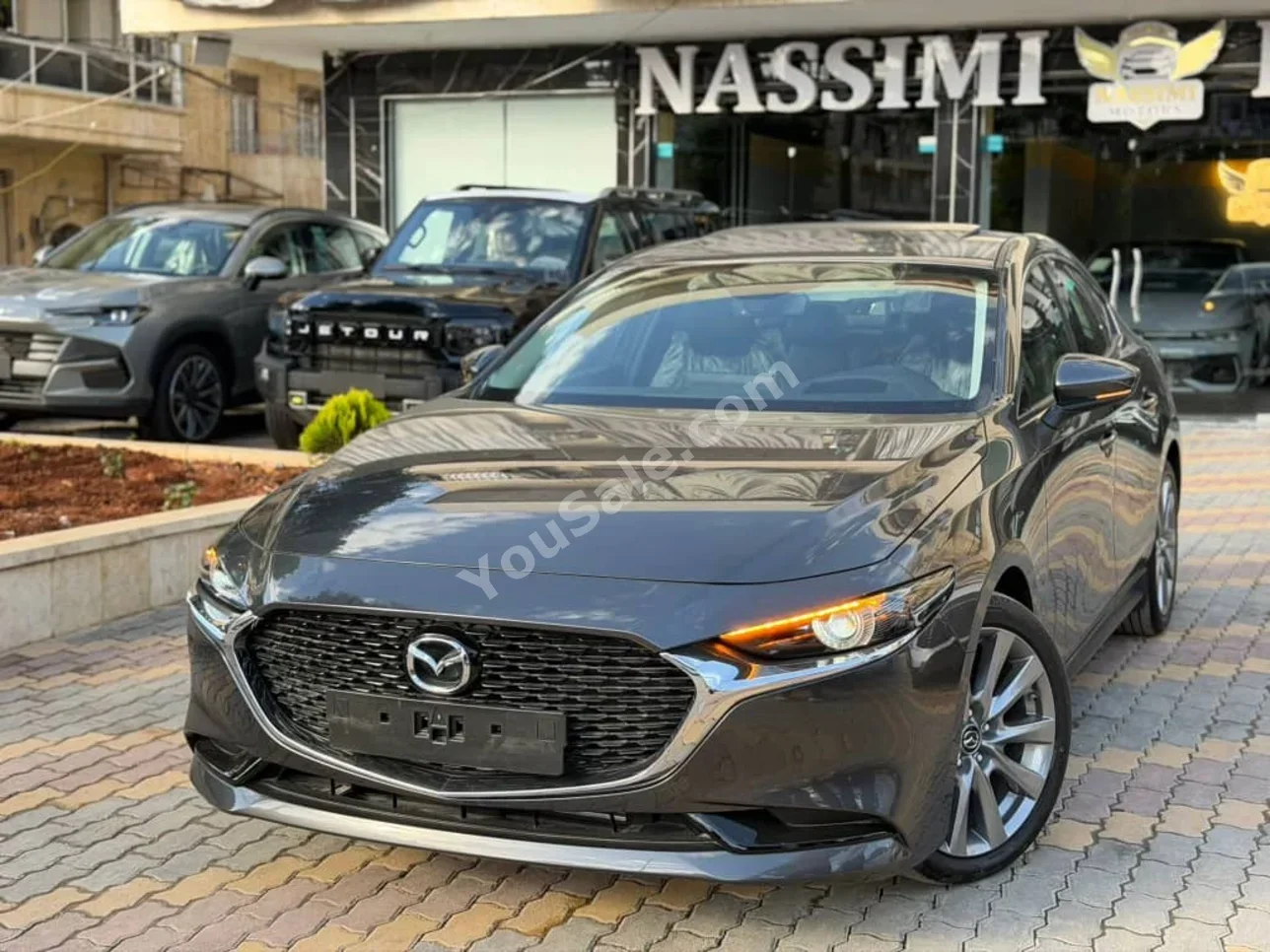 مازدا  مازدا 3  2026  اتوماتيك  0 كم  4 سلندر  دفع أمامي  سيدان  رمادي  بنزين