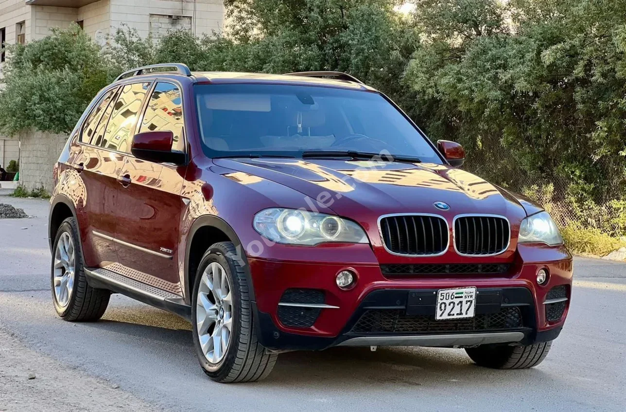 BMW  X-Series  5  2013  Automatic  179,000 km  6 Cylinder  AWD  SUV  Dark Red  Gasoline