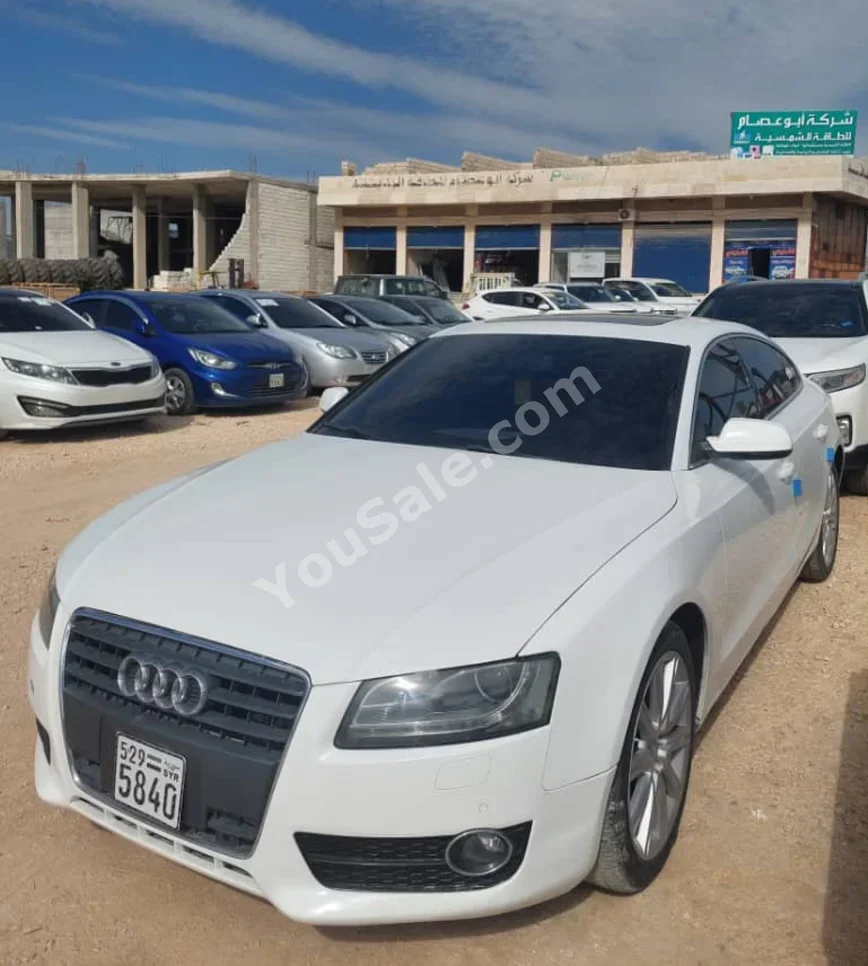 اودي  أي 5  2.0 T  2011  اتوماتيك  126,000 كم  4 سلندر  دفع خلفي  سيدان  أبيض  ديزل