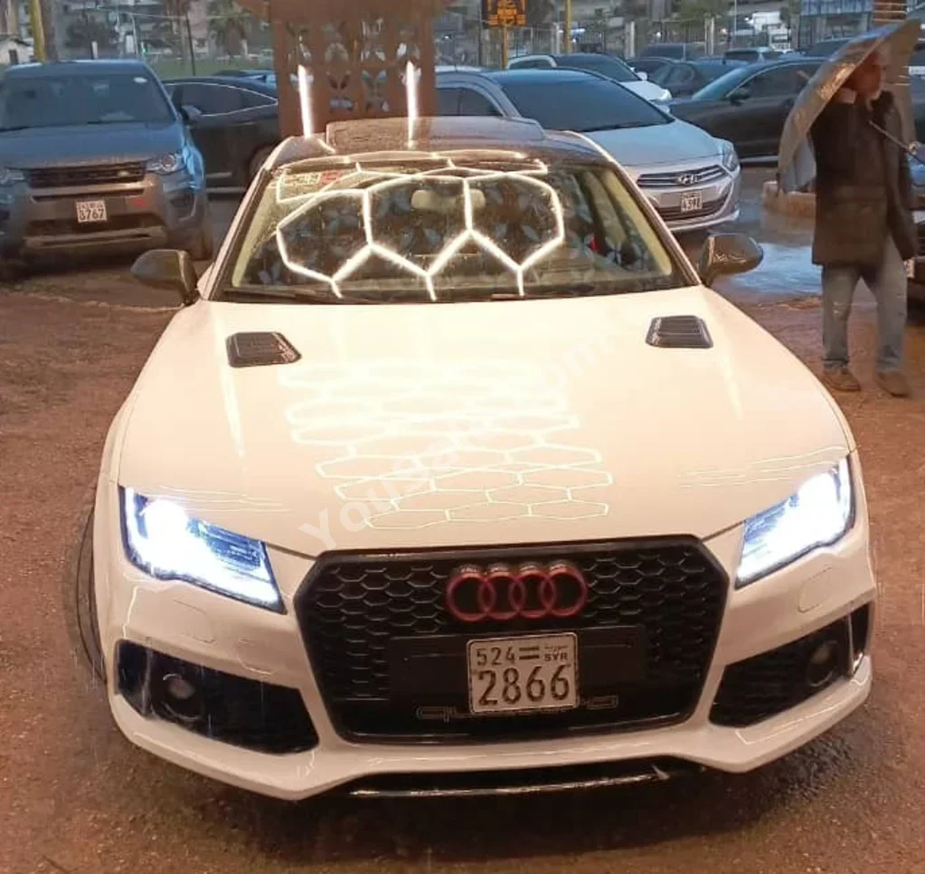 Audi  A7  2012  Automatic  160,000 km  6 Cylinder  4WD  Sedan  White  Gasoline