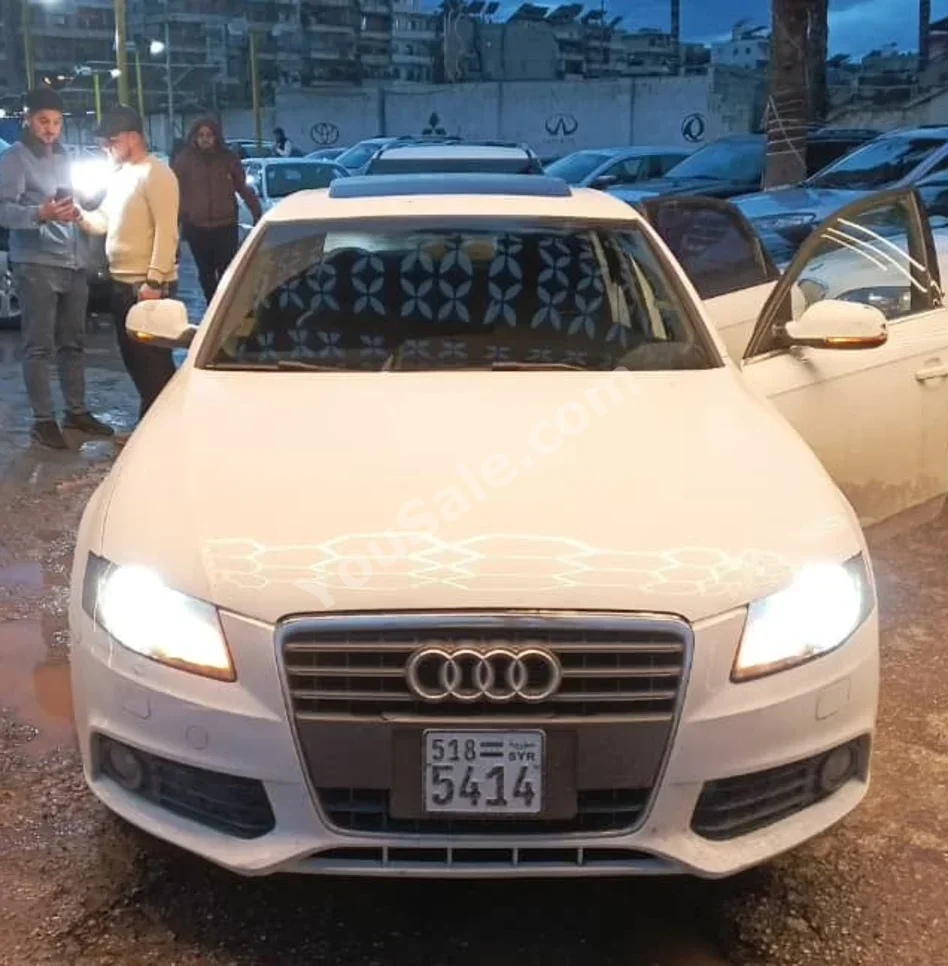 Audi  A4  2.0 T  2011  Automatic  280,000 km  4 Cylinder  4WD  Sedan  White  Gasoline