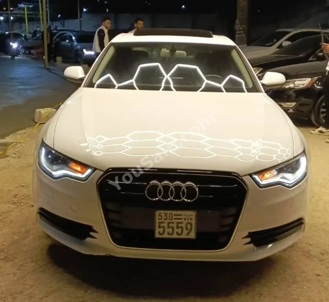 Audi  A6  2.0 T  2014  Automatic  160,000 km  4 Cylinder  4WD  Sedan  White  Diesel