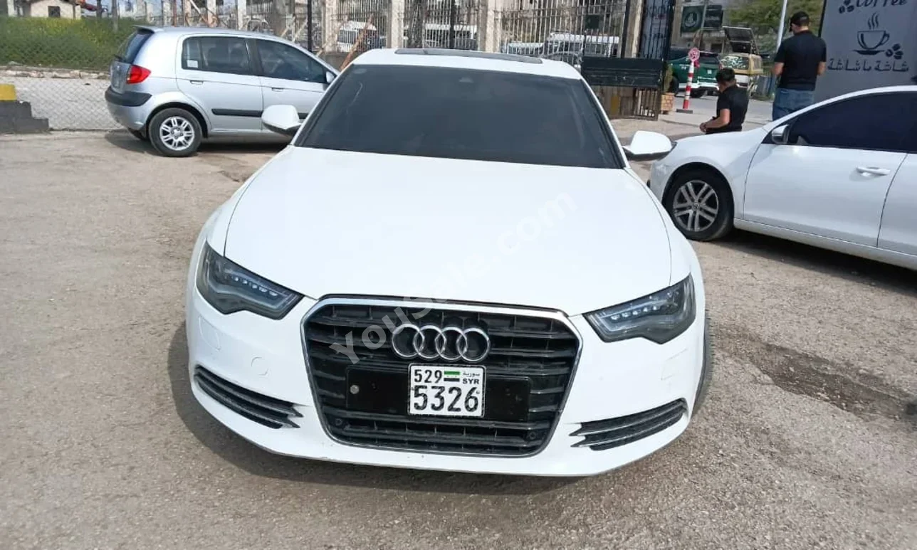 Audi  A6  2015  Automatic  251,000 km  4 Cylinder  4WD  Sedan  White  Diesel