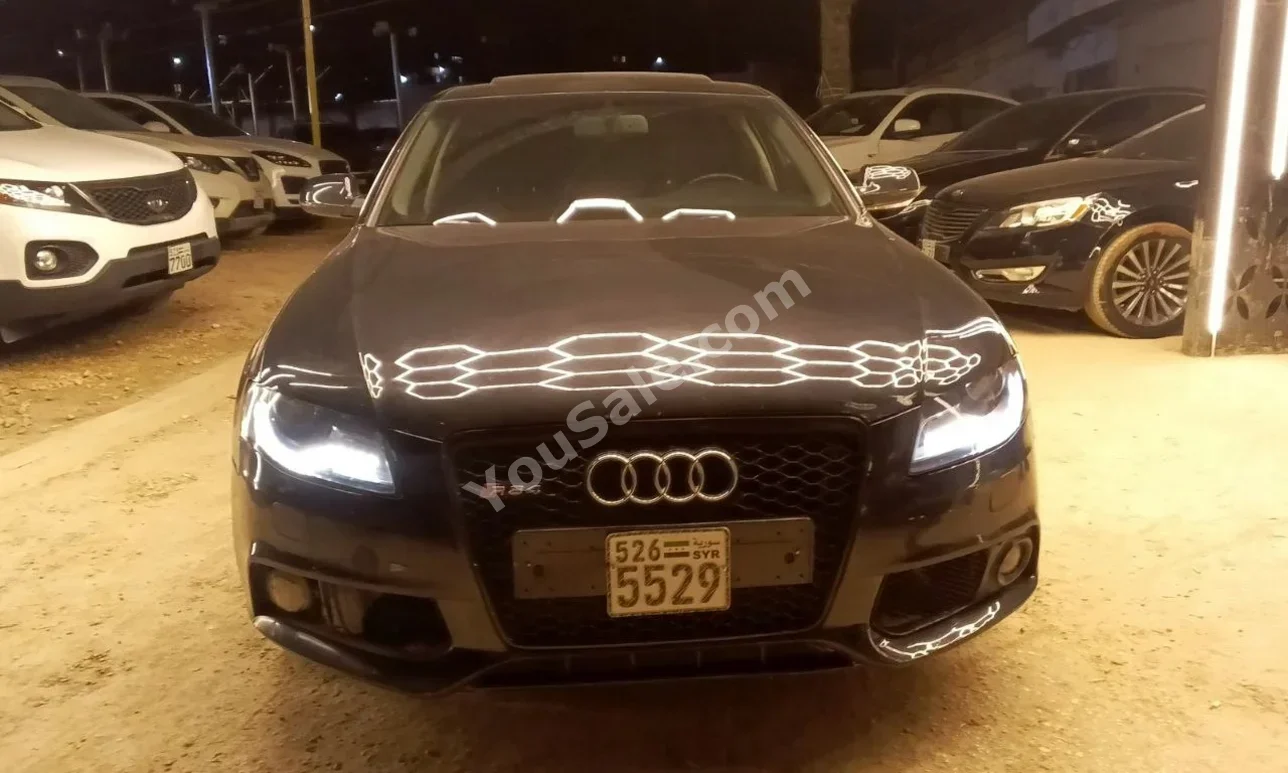 Audi  A4  2011  Automatic  260,000 km  4 Cylinder  4WD  Sedan  Black  Gasoline