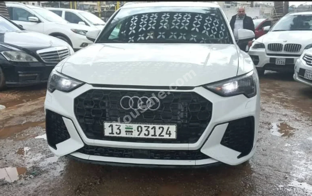 Audi  Q3  2020  Automatic  40,000 km  4 Cylinder  4WD  SUV  White  Gasoline