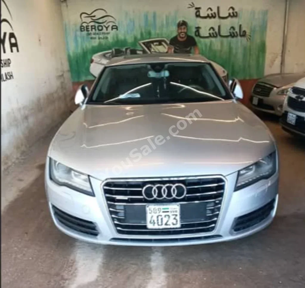 Audi  A7  3.0 T-Quattro  2014  Automatic  187,000 km  4 Cylinder  4WD  Sedan  Silver  Gasoline