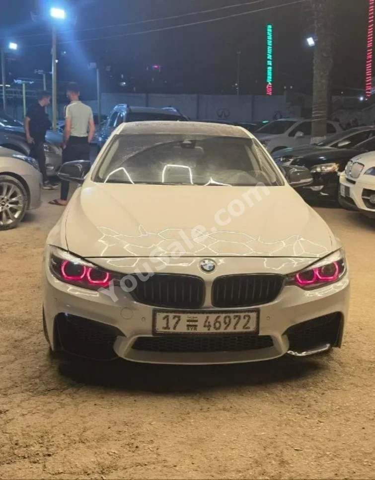 BMW  4-Series  420 I  2018  Automatic  157,000 km  4 Cylinder  RWD  Sedan  White  Diesel