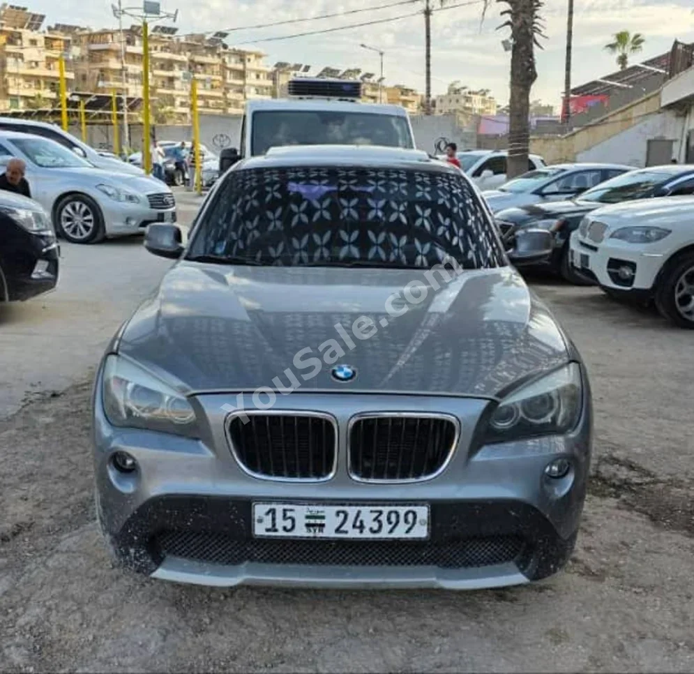 BMW  X-Series  1  2013  Automatic  175,000 km  4 Cylinder  RWD  SUV  Gray  Diesel