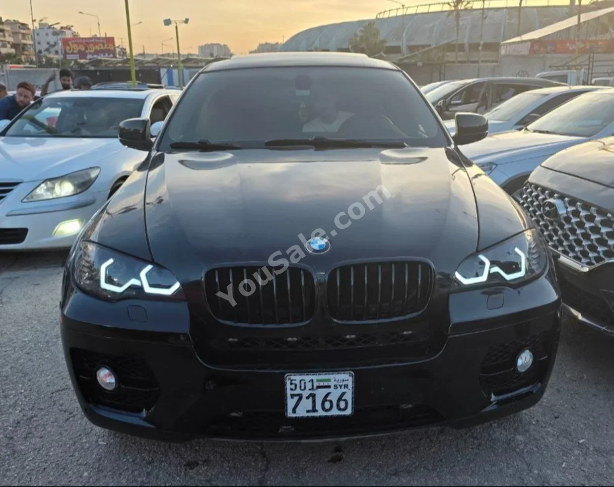 BMW  X-Series  6  2012  Automatic  250,000 km  6 Cylinder  4WD  SUV  Black  Gasoline