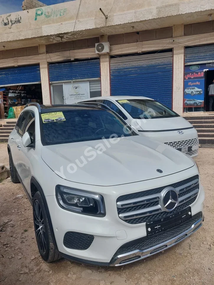 Mercedes-Benz  GLB  250  2021  Automatic  57,000 km  4 Cylinder  RWD  SUV  White  Gasoline
