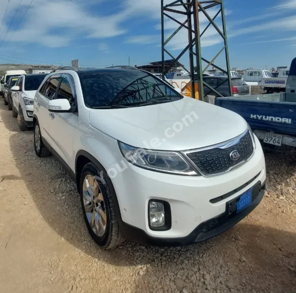 Kia  Sorento  2014  Automatic  142,000 km  4 Cylinder  FWD  SUV  White  Diesel