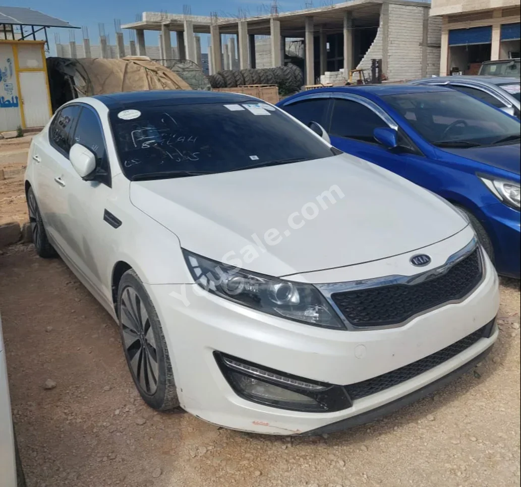 Kia  K5  2011  Automatic  178,000 km  4 Cylinder  FWD  Sedan  White  Gasoline