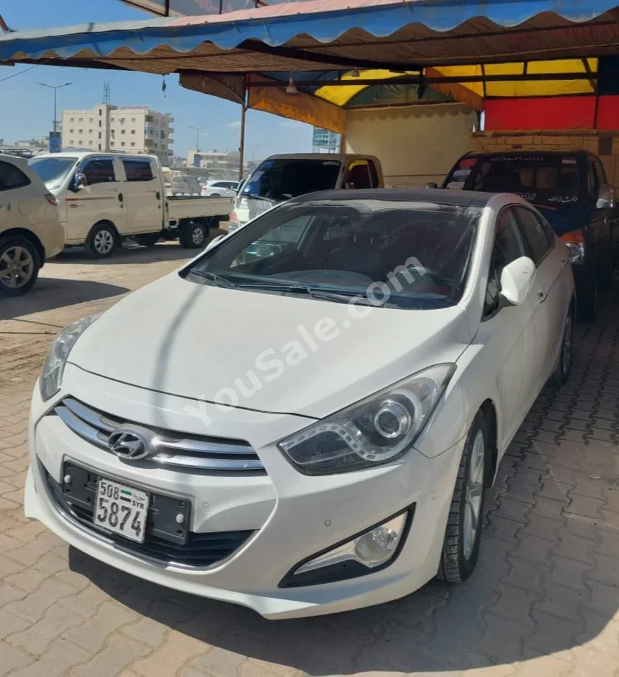 Hyundai  I  40  2011  Automatic  185,000 km  4 Cylinder  FWD  Sedan  White  Diesel