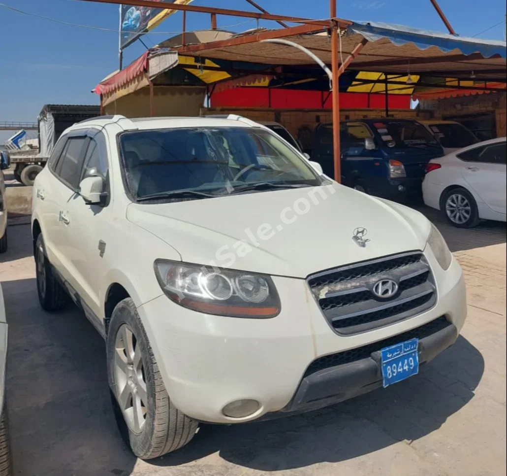 Hyundai  Santa Fe  2008  Automatic  312,000 km  4 Cylinder  FWD  SUV  White  Diesel
