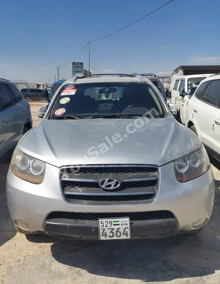 Hyundai  Santa Fe  2006  Automatic  365,000 km  4 Cylinder  FWD  SUV  Silver  Diesel