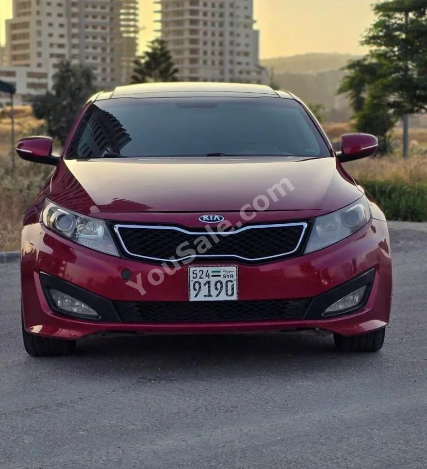 Kia  Optima  2013  Automatic  212,000 km  4 Cylinder  FWD  Sedan  Dark Red  Gasoline