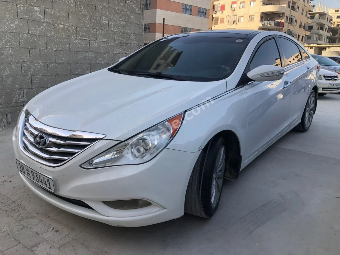 Hyundai  Sonata  2013  Automatic  169,000 km  4 Cylinder  FWD  Sedan  White  Gasoline