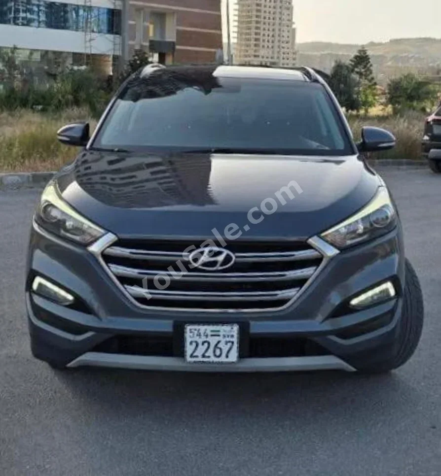 Hyundai  Tucson  2018  Automatic  30,000 km  4 Cylinder  FWD  SUV  Gray  Gasoline