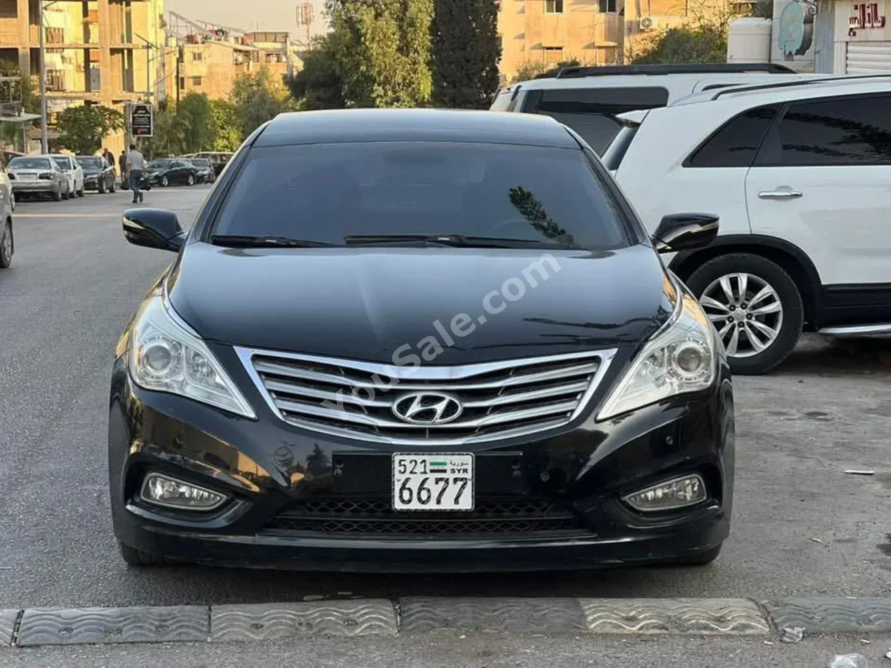 Hyundai Azera 2012 Automatic 130,000 km 4 Cylinder FWD Sedan Black Gasoline