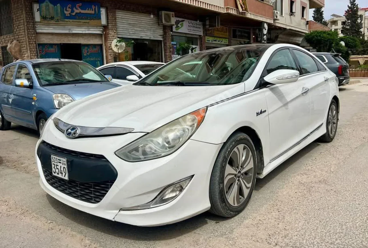 Hyundai  Sonata  2014  Automatic  136,000 km  4 Cylinder  FWD  Sedan  White  Hybrid