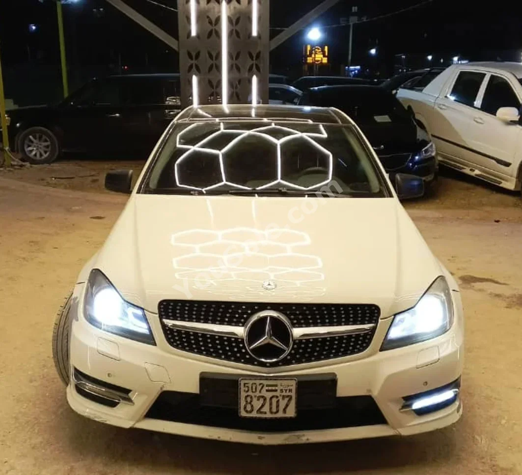 Mercedes-Benz  C-Class  220  2012  Automatic  339,000 km  4 Cylinder  RWD  Sedan  White  Diesel