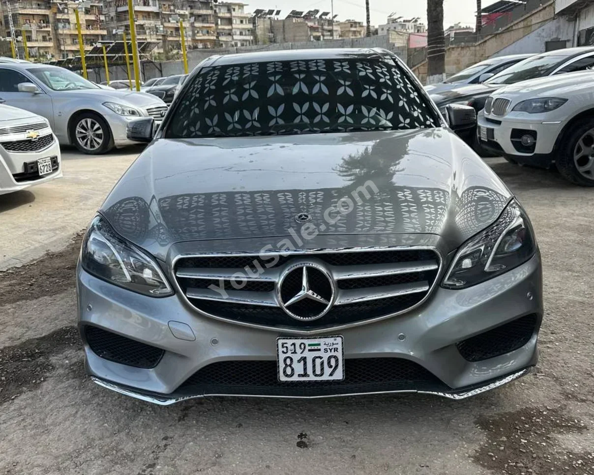 Mercedes-Benz  E-Class  350  2014  Automatic  122,000 km  6 Cylinder  4WD  Sedan  Silver  Gasoline