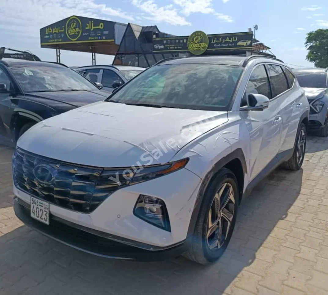Hyundai  Tucson  2025  Automatic  0 km  4 Cylinder  FWD  SUV  White  Hybrid