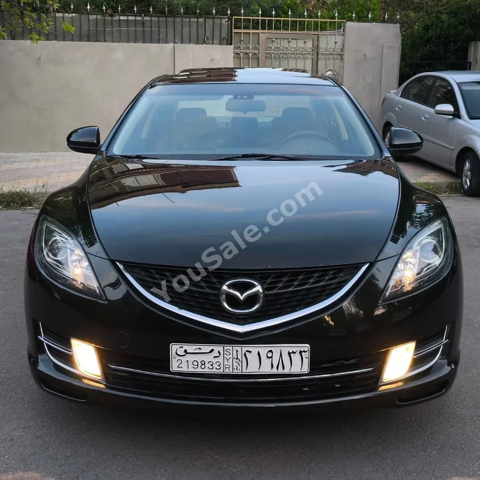 Mazda  Mazda 6  2009  Automatic  70,000 km  4 Cylinder  FWD  Sedan  Black  Gasoline