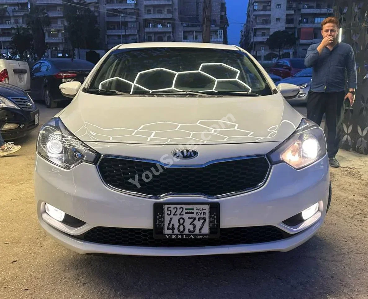 Kia  K3  2013  Automatic  197,000 km  4 Cylinder  FWD  Sedan  White  Gasoline