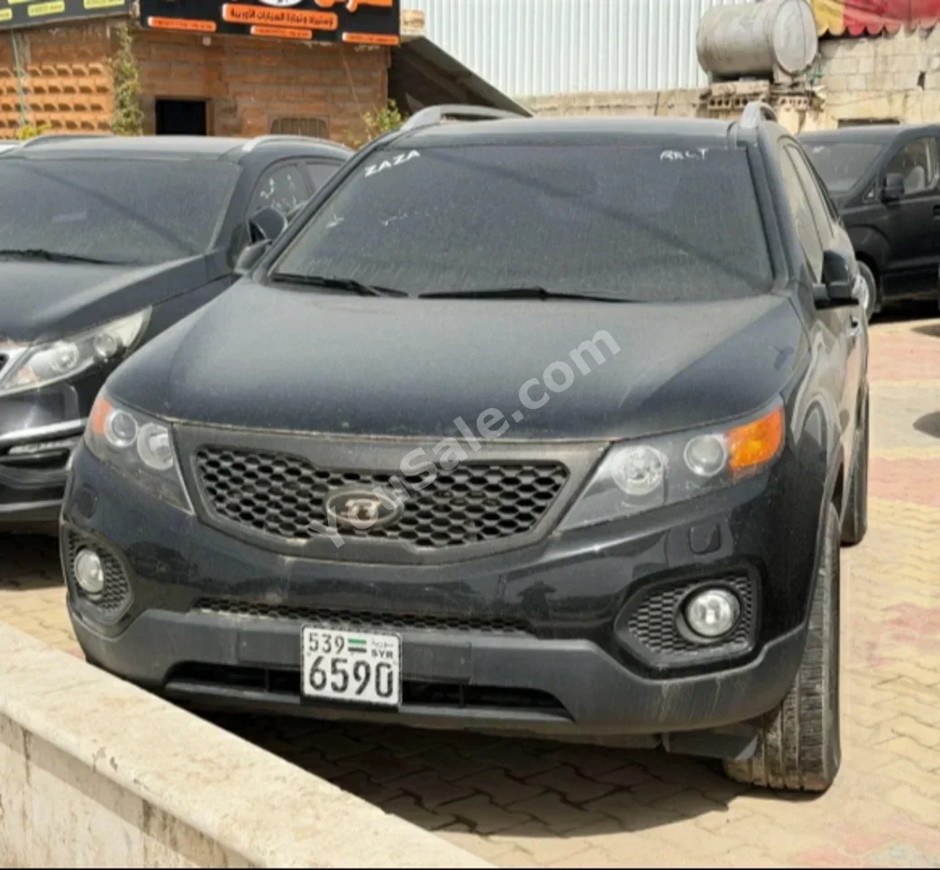 Kia  Sorento  2013  Automatic  212,000 km  4 Cylinder  FWD  SUV  Black  Diesel