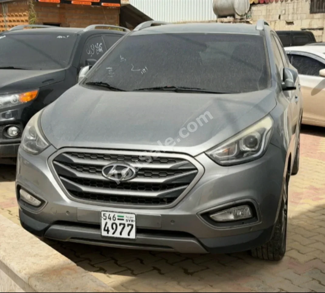 Hyundai Tucson 2015 Automatic 162,000 km 4 Cylinder FWD SUV Silver Diesel